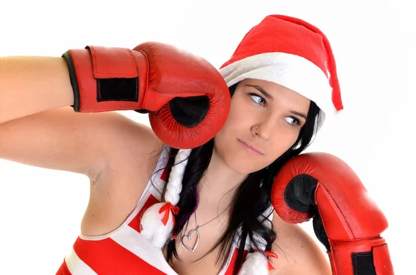 Noel Baba Noel kadın şapka giyen boks eldivenleri kutluyor. — Stok fotoğraf