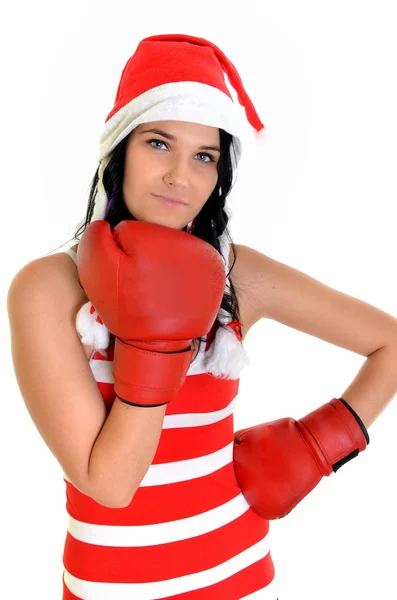 Santa hat vánoční žena slaví nosí Boxerské rukavice. — Stock fotografie