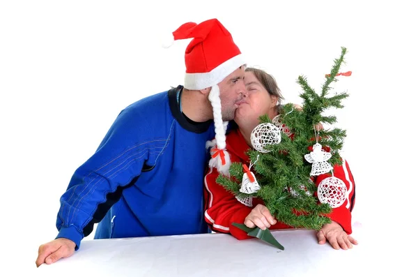 Couple with down syndrome with christmas decoration — Stock Photo, Image
