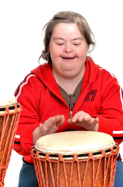 Down syndrome with djembe — Stock Photo, Image