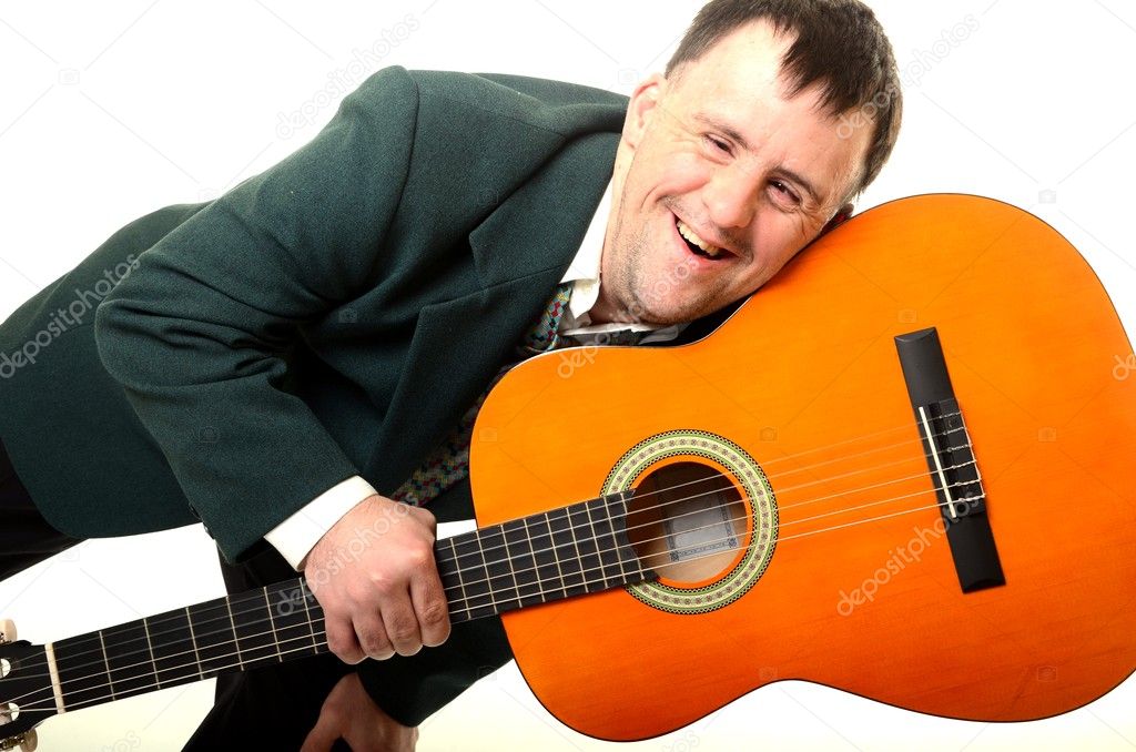 Down syndrome man with guitar