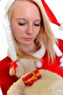 beyaz Noel Baba kostümü giyen güzel ve seksi sarışın kadın