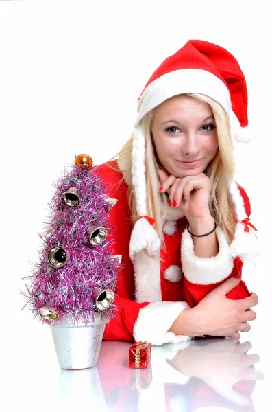 Schöne und sexy blonde Frau trägt Weihnachtsmann Klausel Kostüm auf weiß — Stockfoto