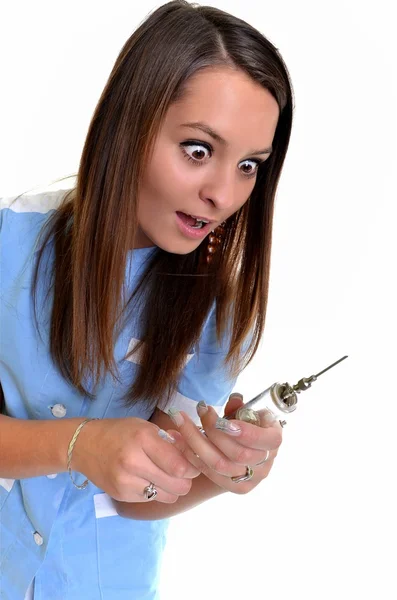 Beautiful young doctor with injection — Stock Photo, Image