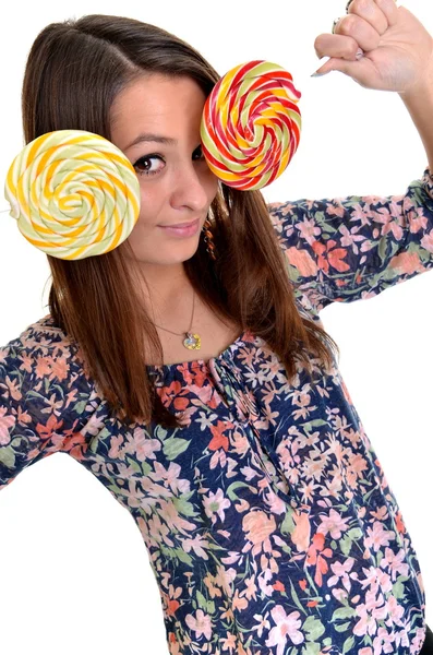 Sexy young brunette woman with a lollipop — Stock Photo, Image