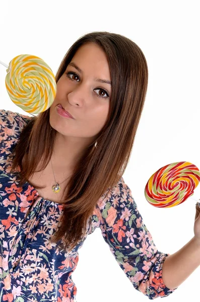 Sexy jonge brunette vrouw met een lolly — Stockfoto