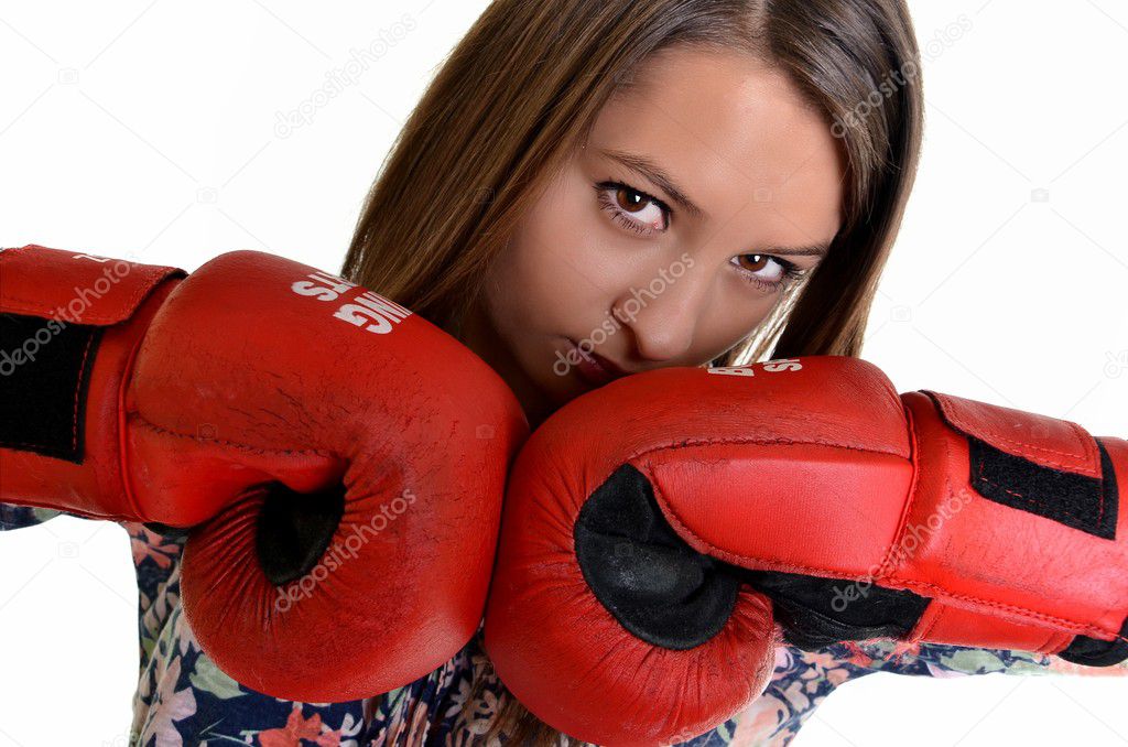 Close up of female boxer over white