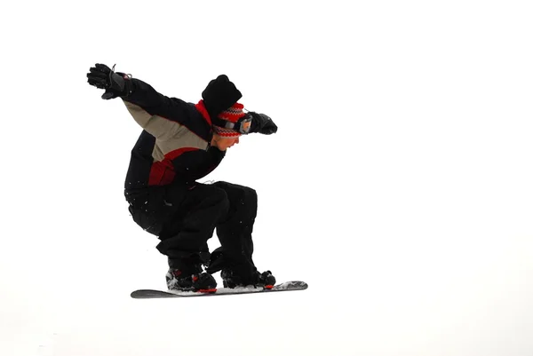 Сноубордист під час стрибка у горах у сонячний день . — стокове фото