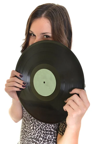 Menina bonita com vinil disco no fundo branco — Fotografia de Stock