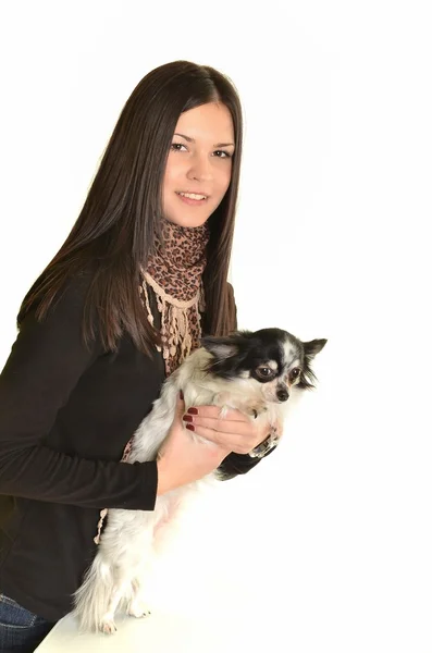 Girl posing in studio with her small dog — Stock Photo, Image