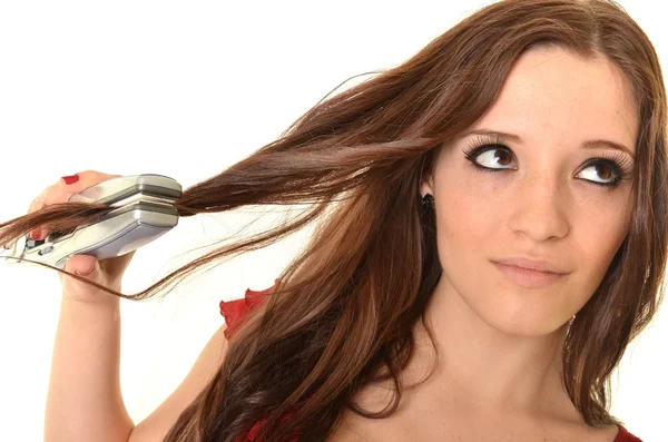 Retrato de jovem menina bonita fazendo penteado — Fotografia de Stock