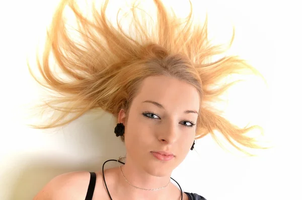 Junge schöne sexy blonde Mädchen auf weißem Hintergrund — Stockfoto
