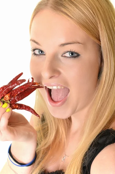 Woman with chilli peppers — Stock Photo, Image
