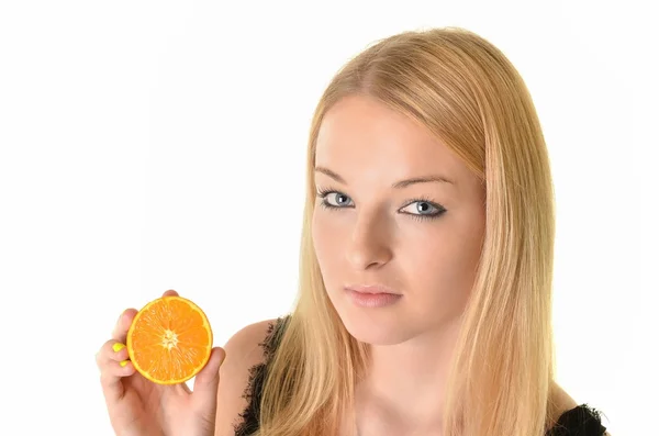 Portrait of young smiling woman with orange — Stock Photo, Image