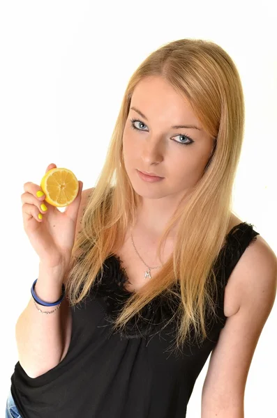 Portrait of young smiling woman with lemon — Stock Photo, Image