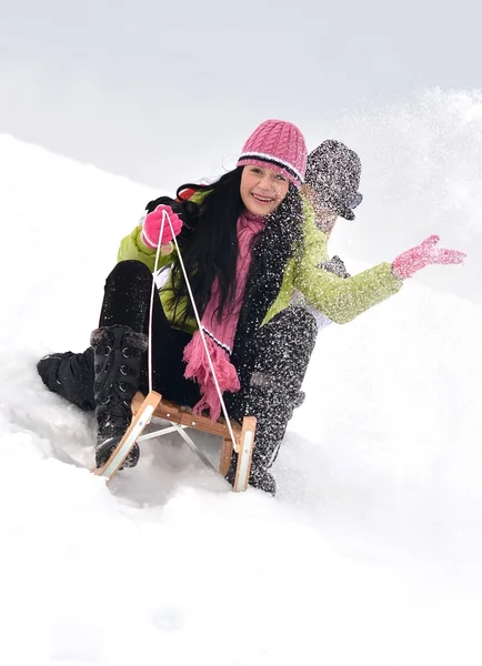 Young women with sled — Stock Photo, Image