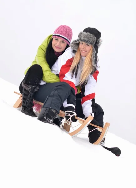Girls sledding — Stock Photo, Image