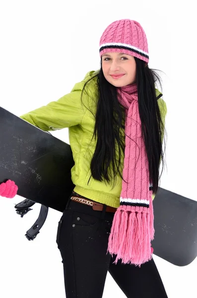 Mulher com snowboard em pé no topo da montanha nevada — Fotografia de Stock