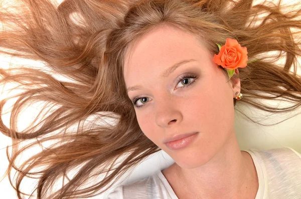 stock image Beautiful young woman with roses