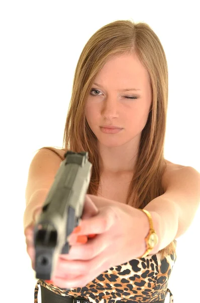 Sexy kobieta z pistoletu na białym tle — Zdjęcie stockowe