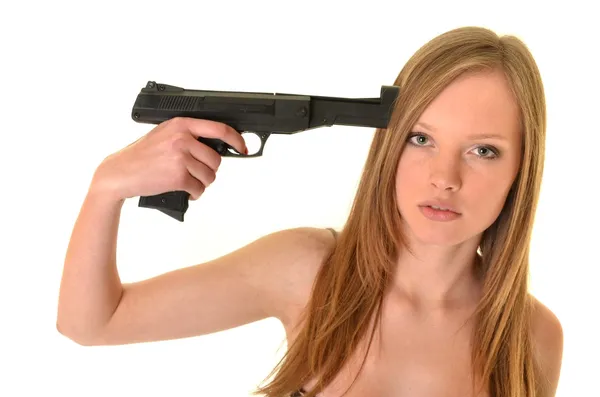 Σέξι γυναίκα με όπλο που απομονώνονται σε λευκό — Φωτογραφία Αρχείου