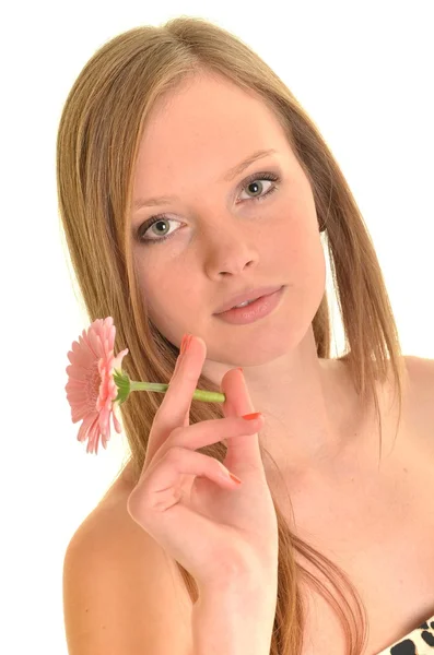 Krásná mladá žena s gerber květiny izolované na bílém pozadí — Stock fotografie