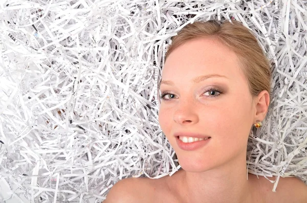 Woman with shredded paper — Stock Photo, Image