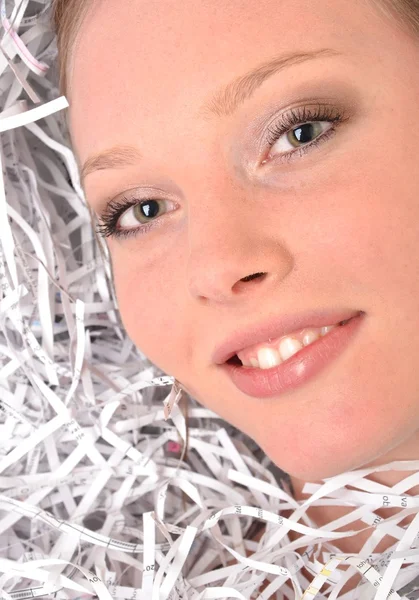 Woman in shredded paper — Stock Photo, Image