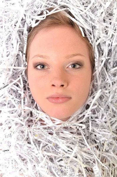 Woman in shredded paper — Stock Photo, Image
