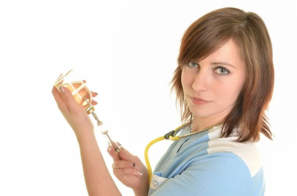 Smiling medical doctor woman with stethoscope. Isolated over white backgrou Stock Image