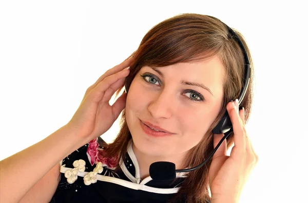 Női ügyfélszolgálat fülhallgatóval és mosollyal — Stock Fotó