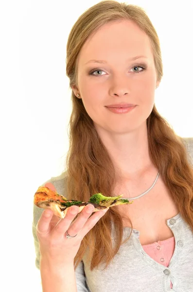 Девушка ест пиццу изолированы на белом — стоковое фото