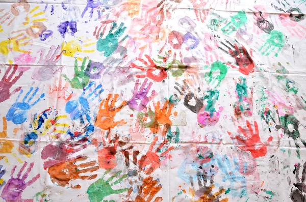 Handprints in different colors in a mural. — Stock Photo © Toniflap ...