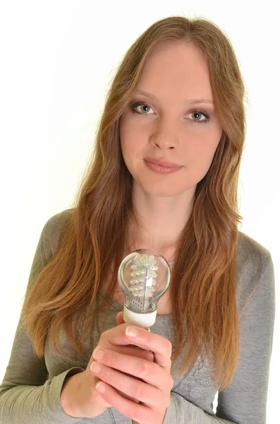 白で隔離されるダイオード電球を持つ女性 — ストック写真