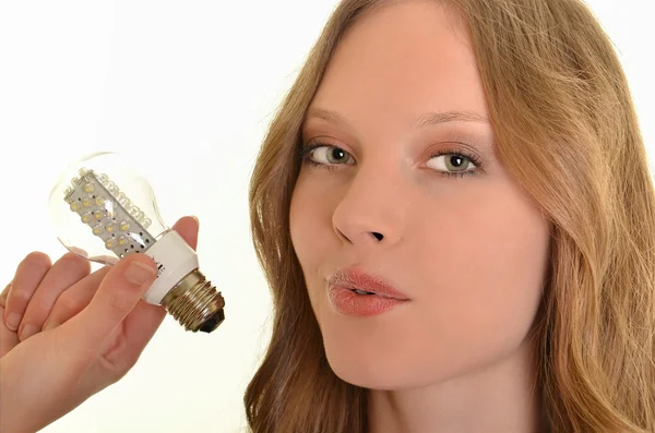Sexy Frau mit Diodenlampe isoliert auf weiß — Stockfoto