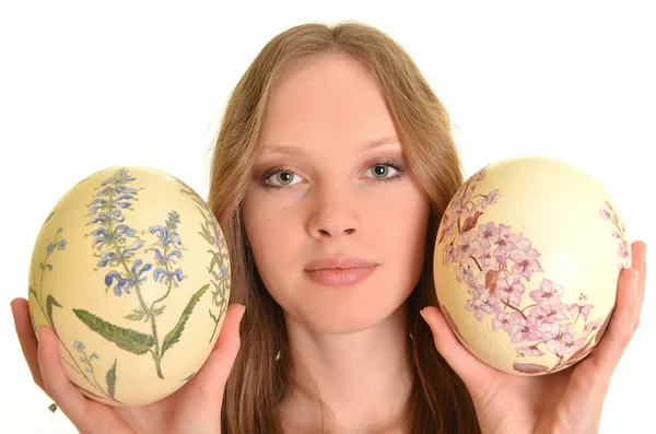 Portrét sexy modelka drží velikonoční vajíčka — Stock fotografie