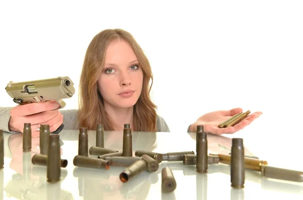 Жінка з пістолетом ізольована на білому — стокове фото