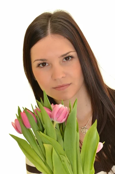 Beyaz arka plan üzerinde izole Pembe Lale buketi çiçek gülümseyen kadın — Stok fotoğraf