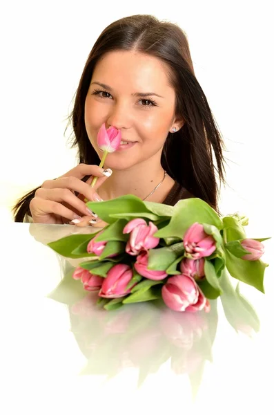 Mulher com tulipas — Fotografia de Stock