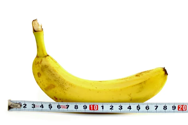 Plátano grande y cinta métrica en blanco — Foto de Stock