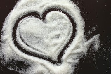 Abstract heart from sugar grains clipart