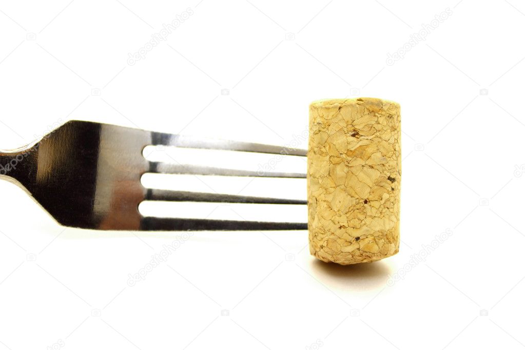 Fork and cork on white background