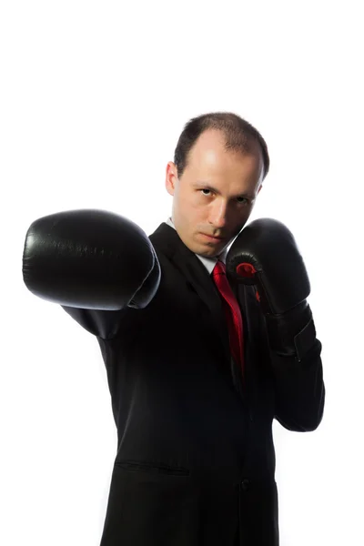 Uomo d'affari con cravatta e guanti da boxe — Foto Stock