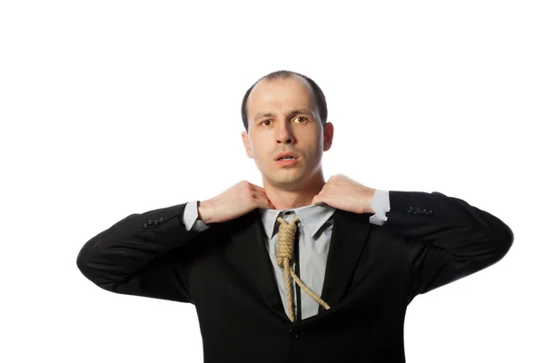 Uomo d'affari con cravatta a forca soffocante e cercando di liberarlo — Foto Stock
