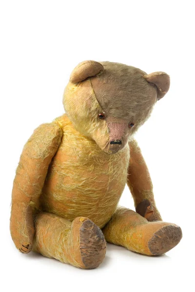 Touching old teddy bear — Stock Photo, Image