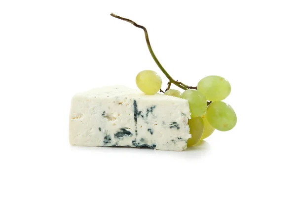 Wedge of gorgonzola decorated with grapes isolated on white back — Stock Photo, Image