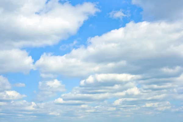 Blue sky with clouds, large and small Royalty Free Stock Photos