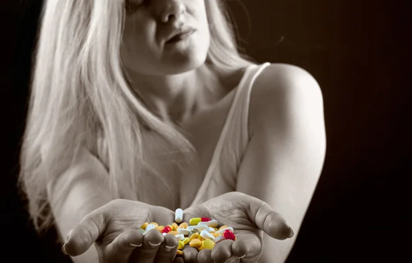 Woman with pills — Stock Photo, Image