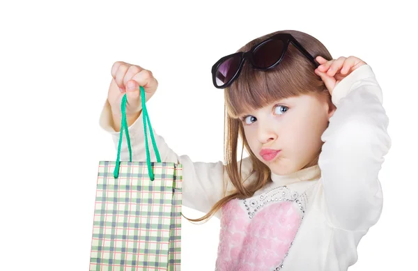 Little girl with package — Stock Photo, Image