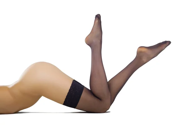 Belle gambe femminili in calze — Foto Stock